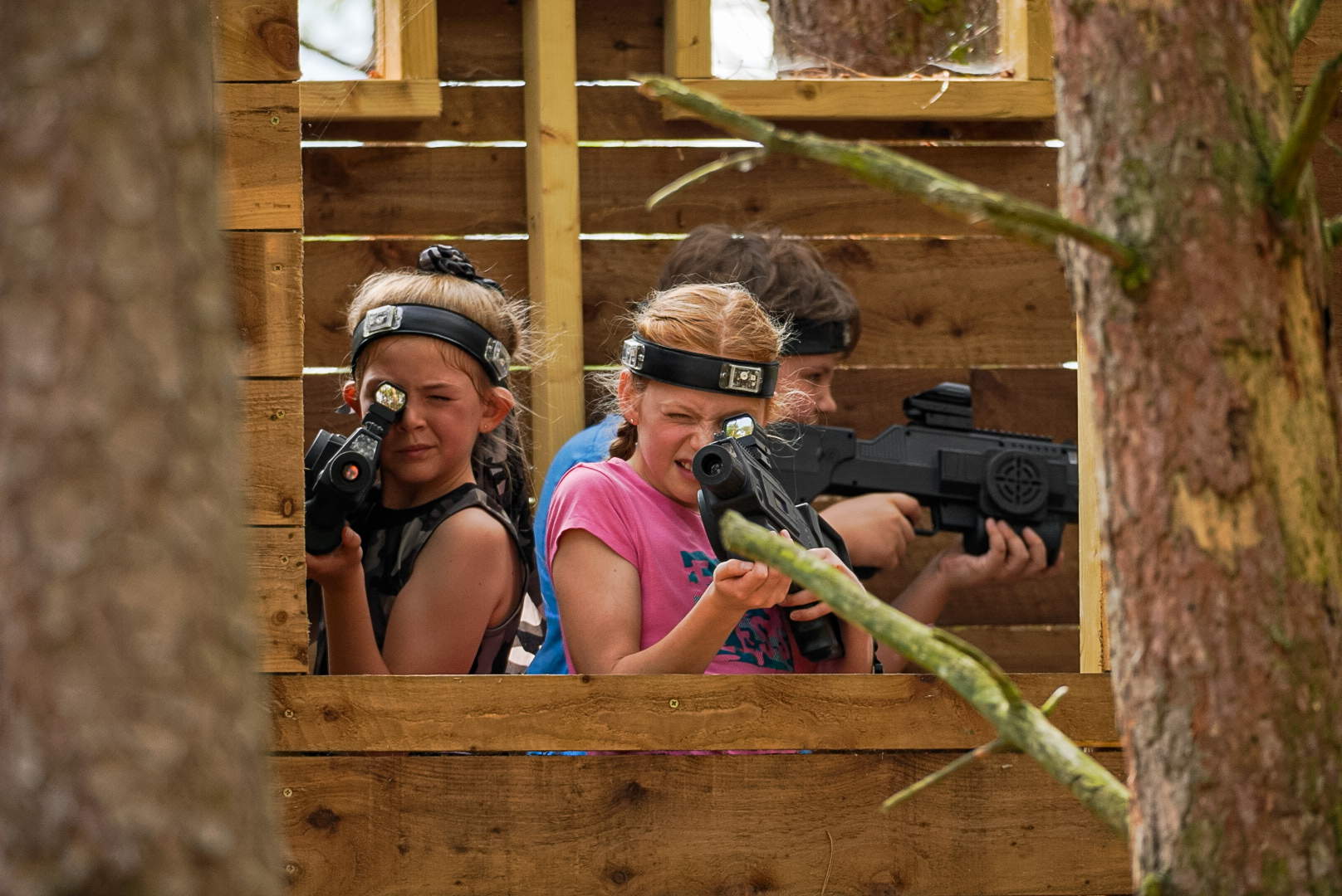 children friends at rumble live action gaming outdoor lasertag